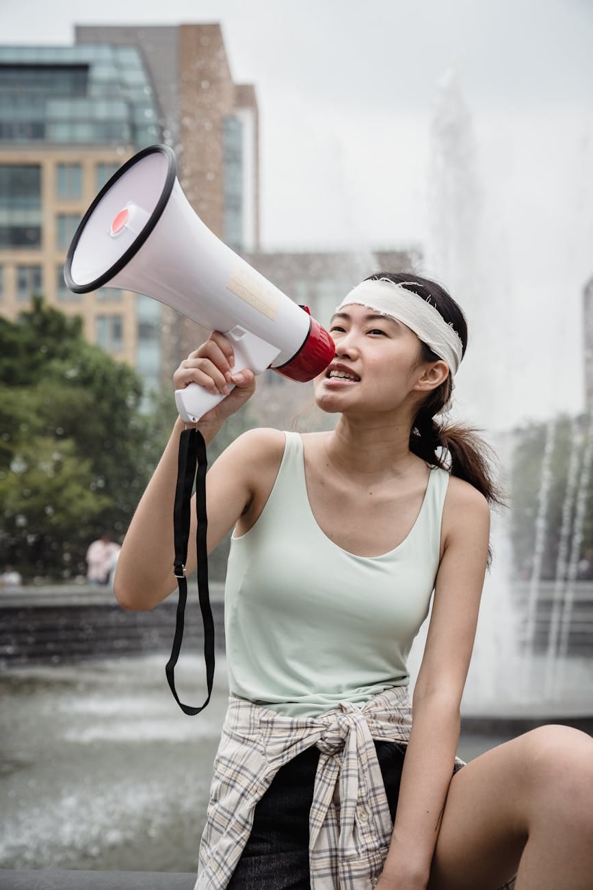 female protester using a megaphone