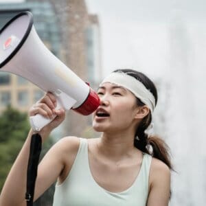 female protester using a megaphone