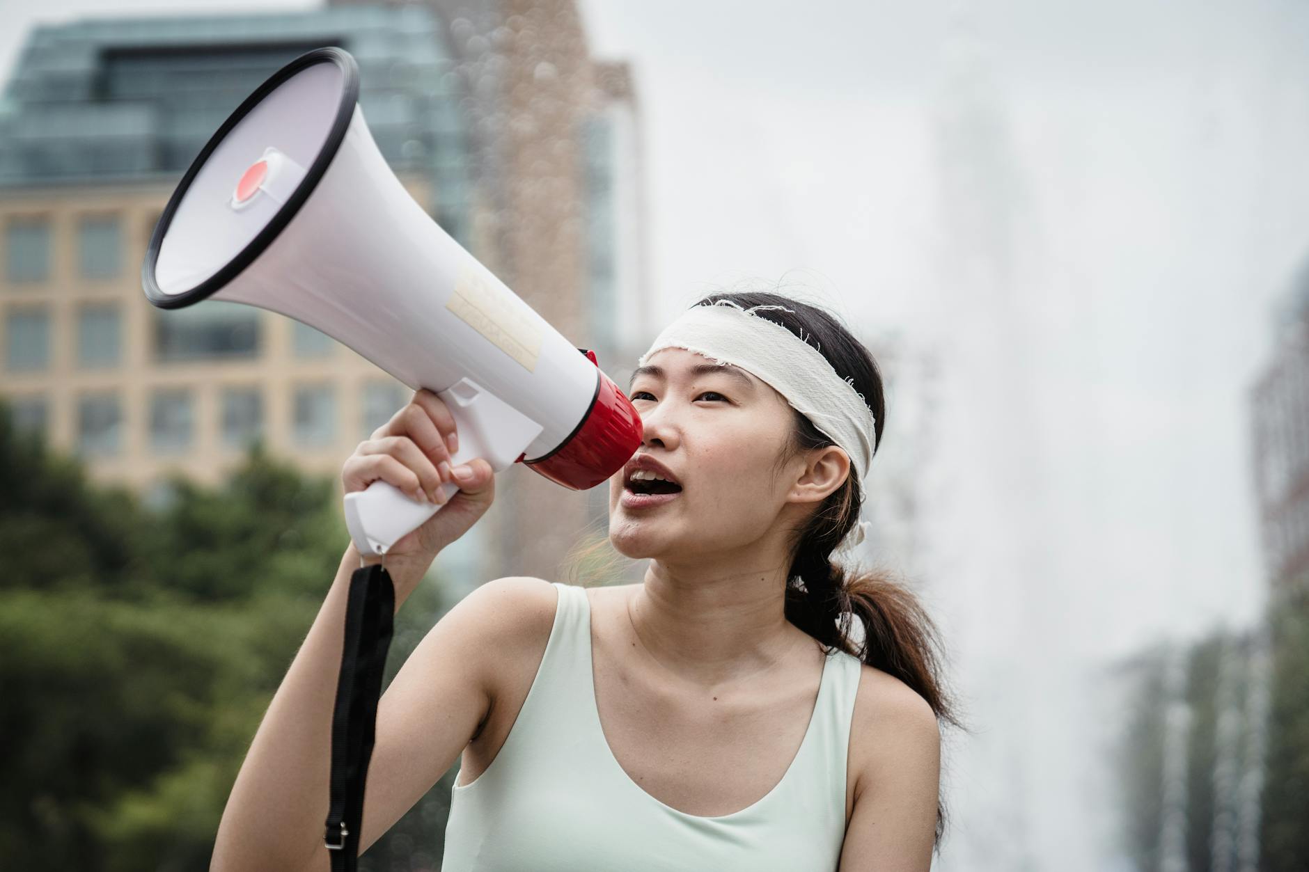 female protester using a megaphone